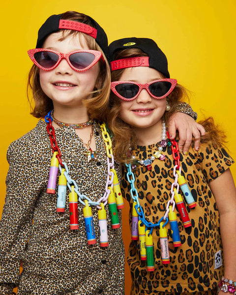 Days of the Week Lip Balm Necklace - Where The Sidewalk Ends Toy Shop